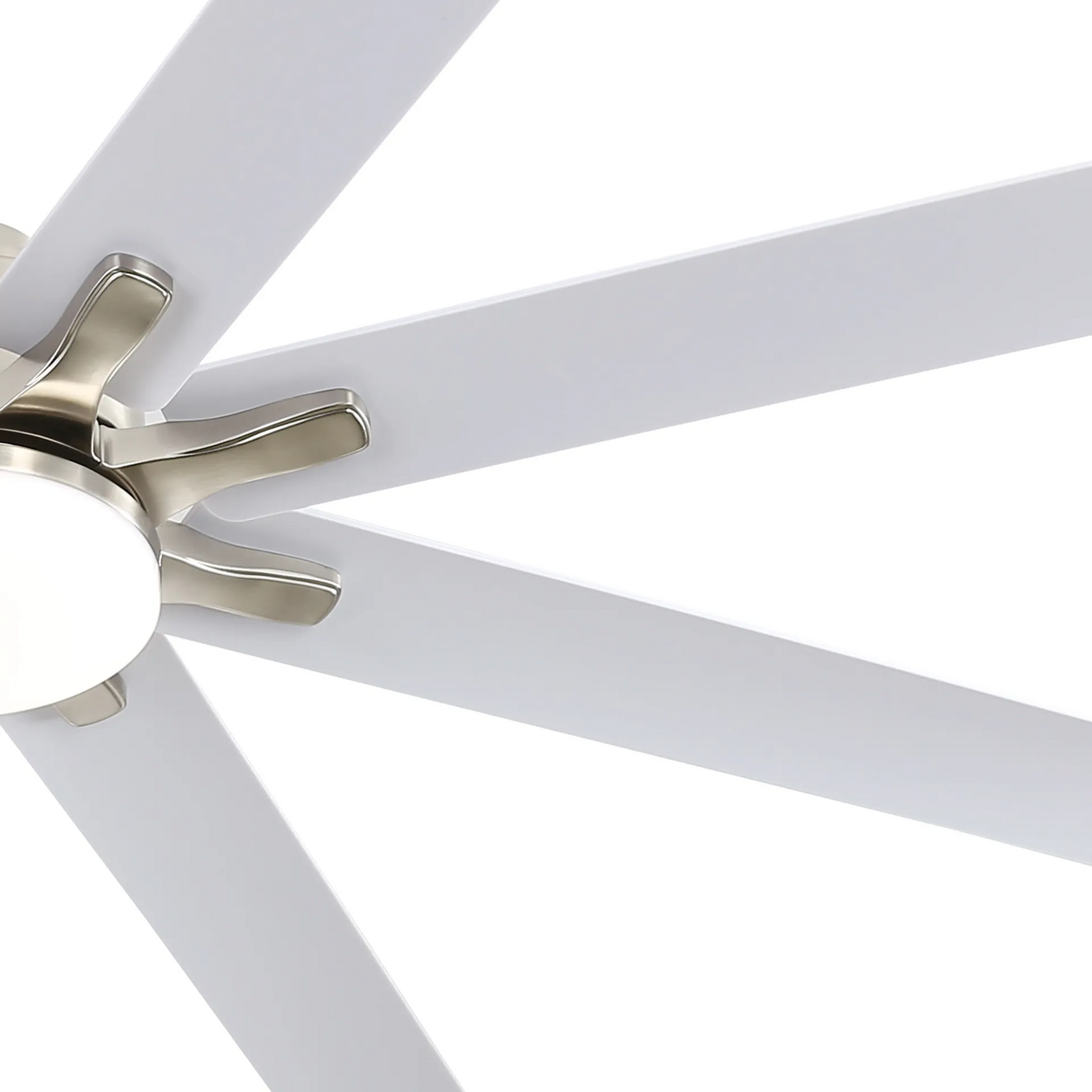 Closeup of a modern white ceiling fan with brushed nickel accents and integrated LED light