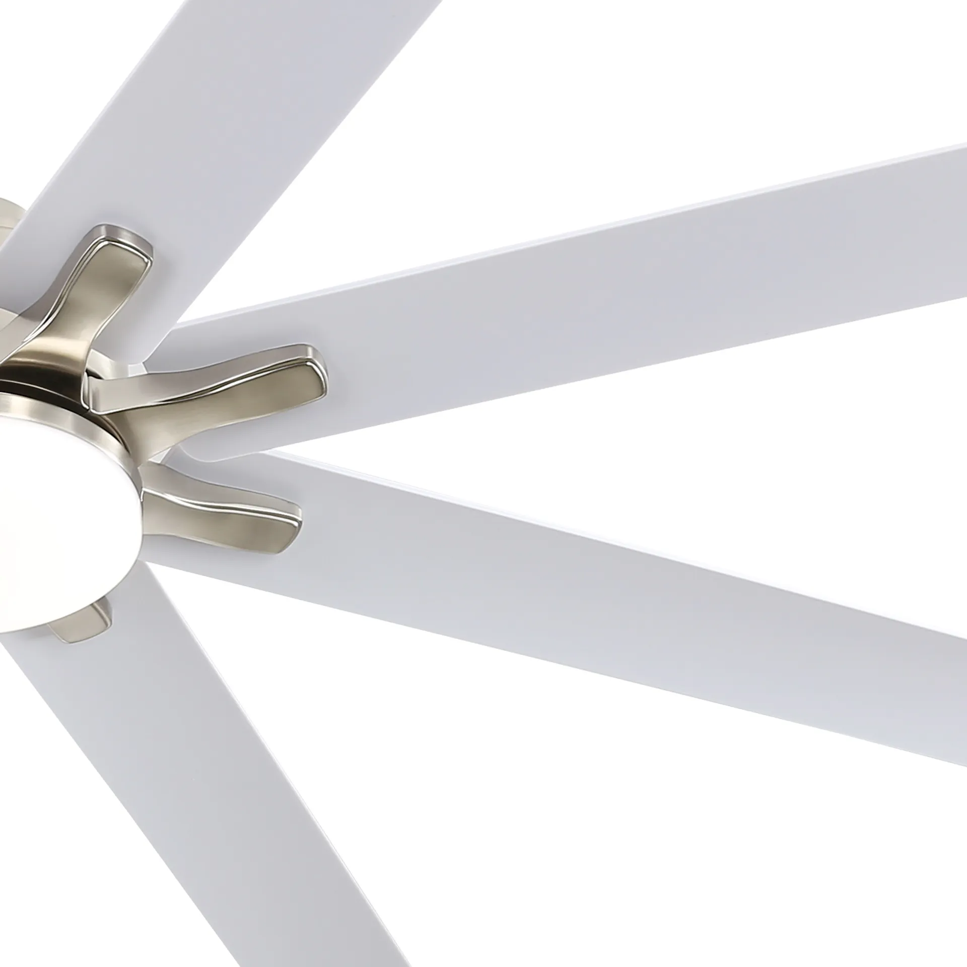 Closeup of a modern white ceiling fan with brushed nickel accents and integrated LED light