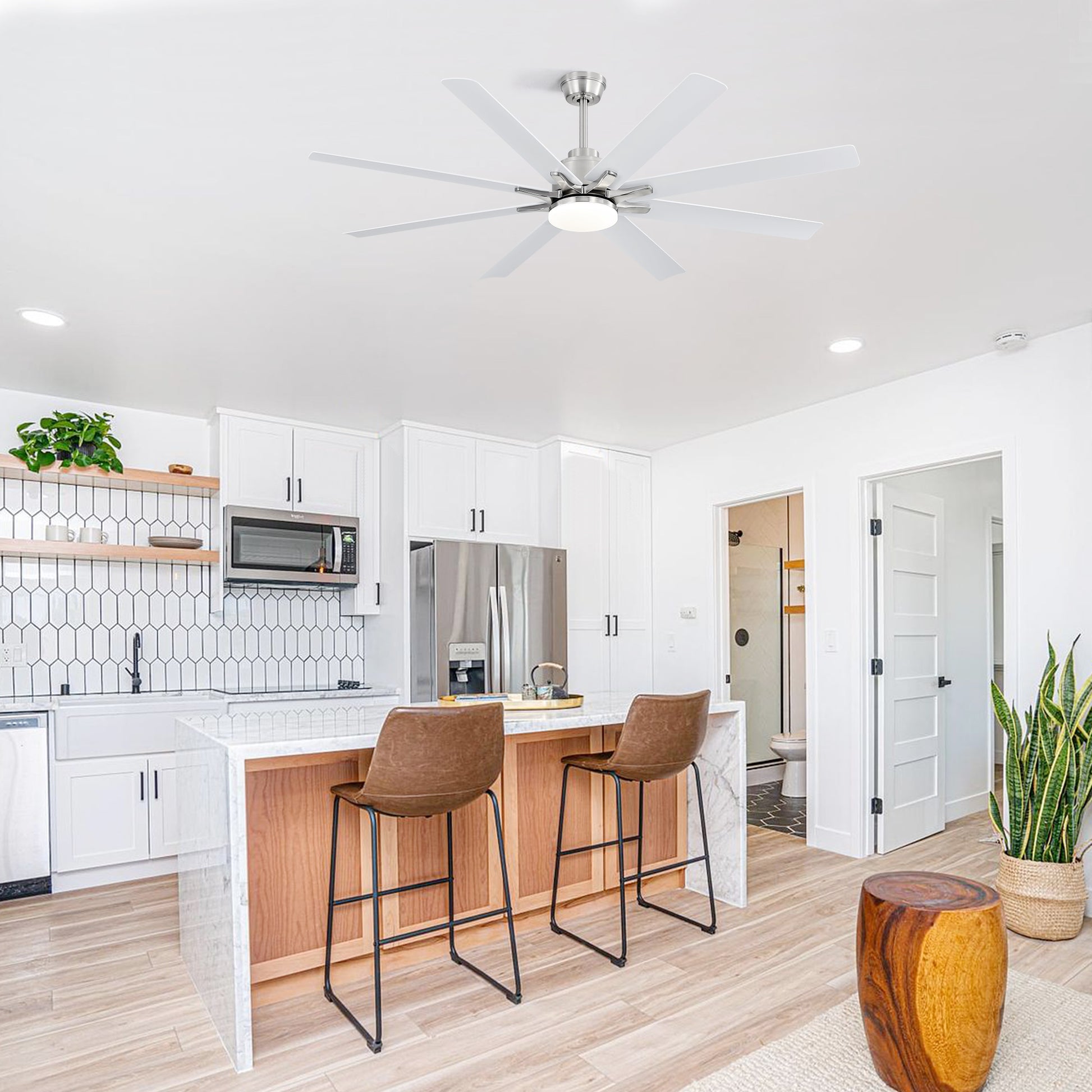 Modern white blade ceiling fan with integrated LED light and brushed nickel finish