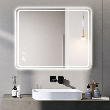 Modern rectangular LED bathroom mirror with touch controls and integrated lighting for a clean aesthetic