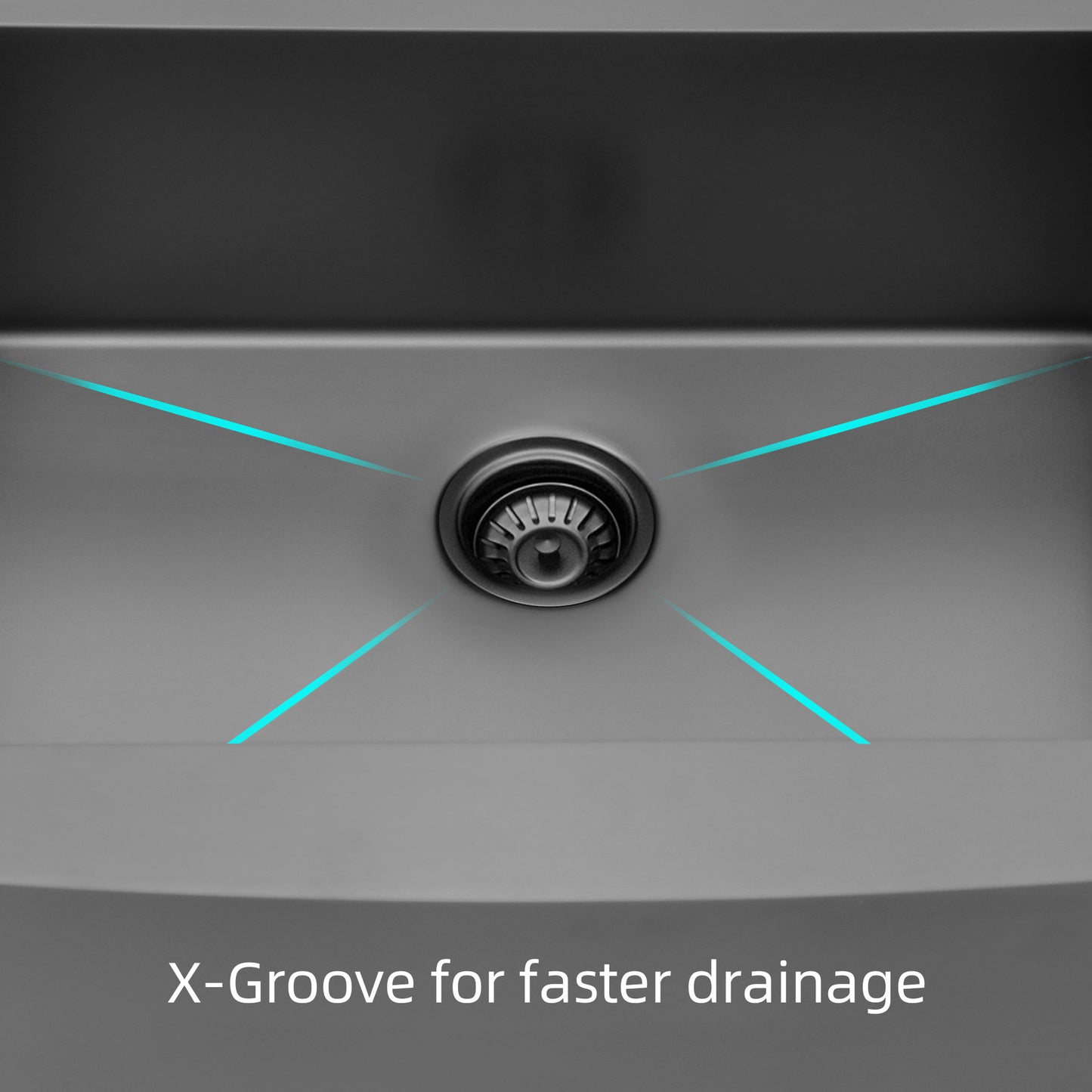 Closeup of a gray stainless steel sinks drain with xgrooves for fast drainage