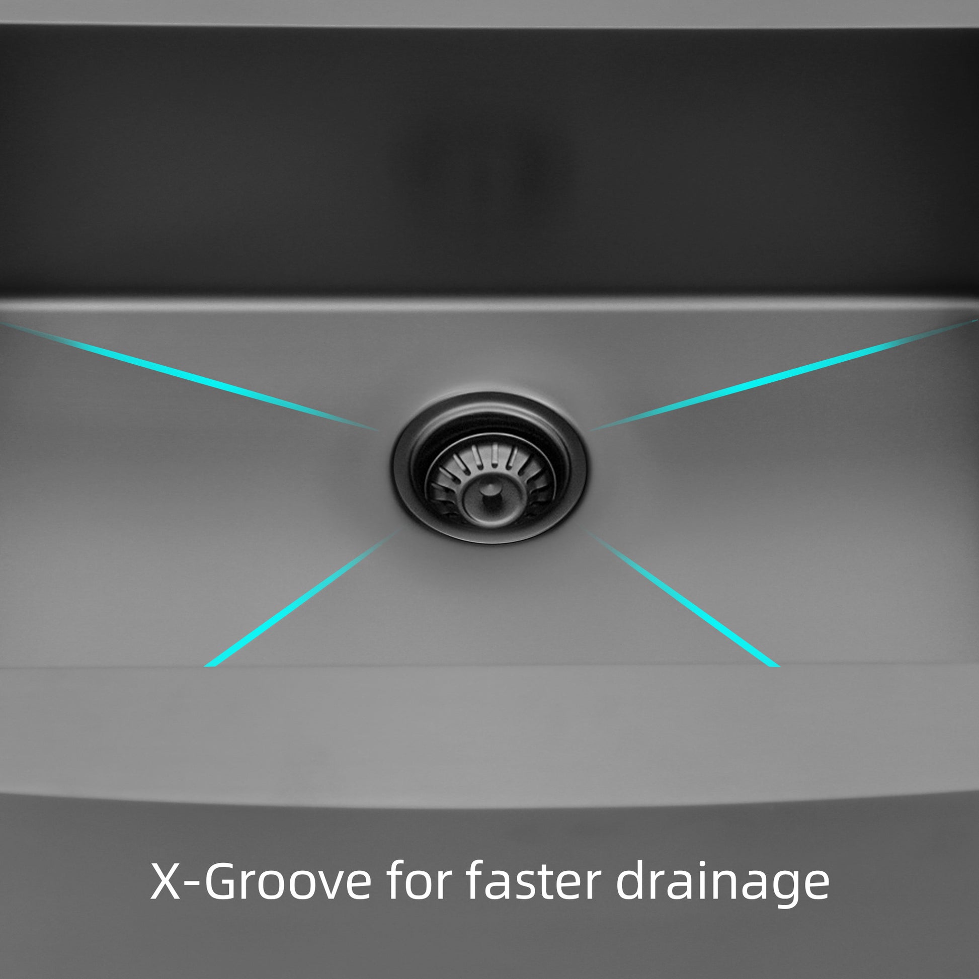 Closeup of a gray stainless steel sinks drain with xgrooves for fast drainage