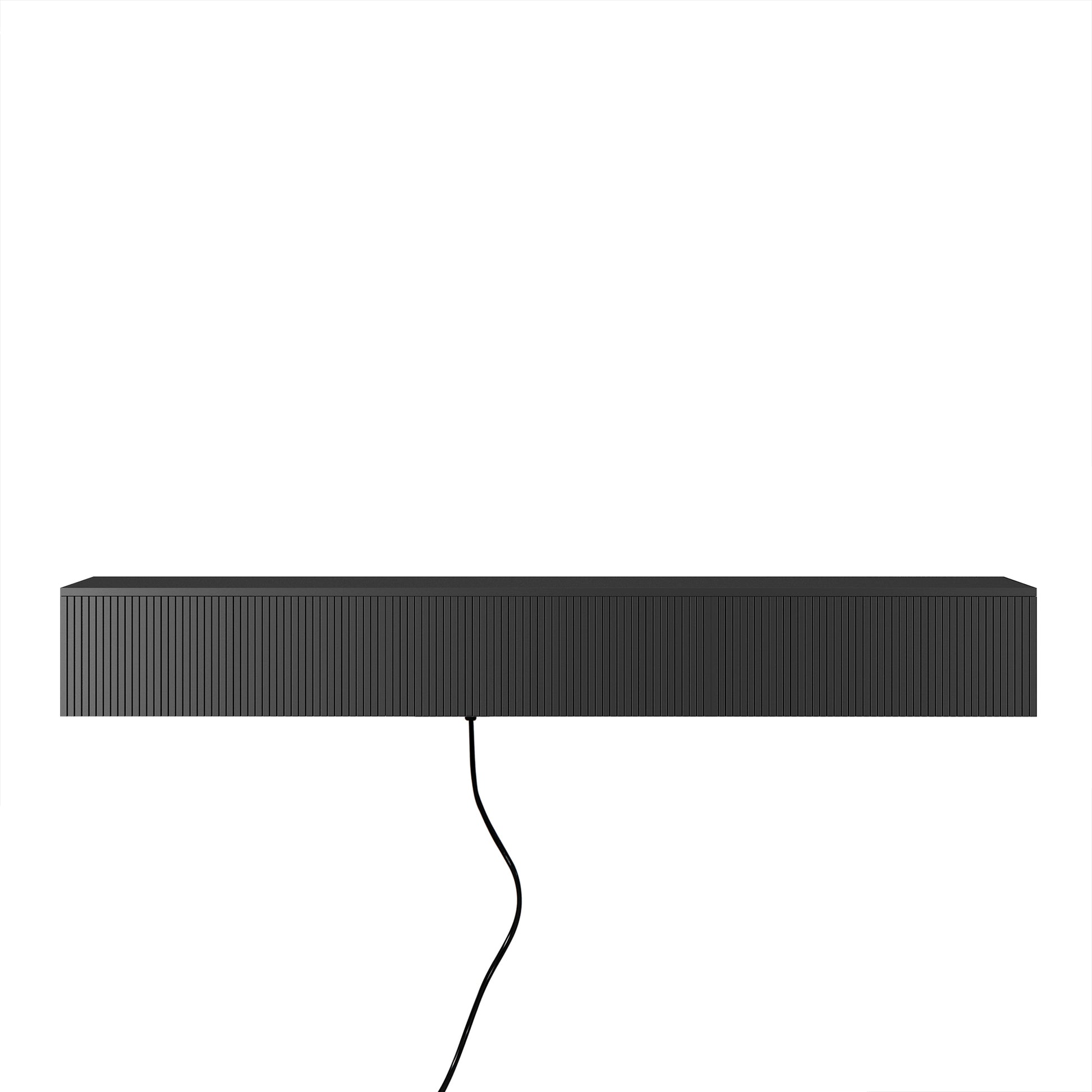 Sleek black soundbar with vertical ribbed texture and integrated power cord