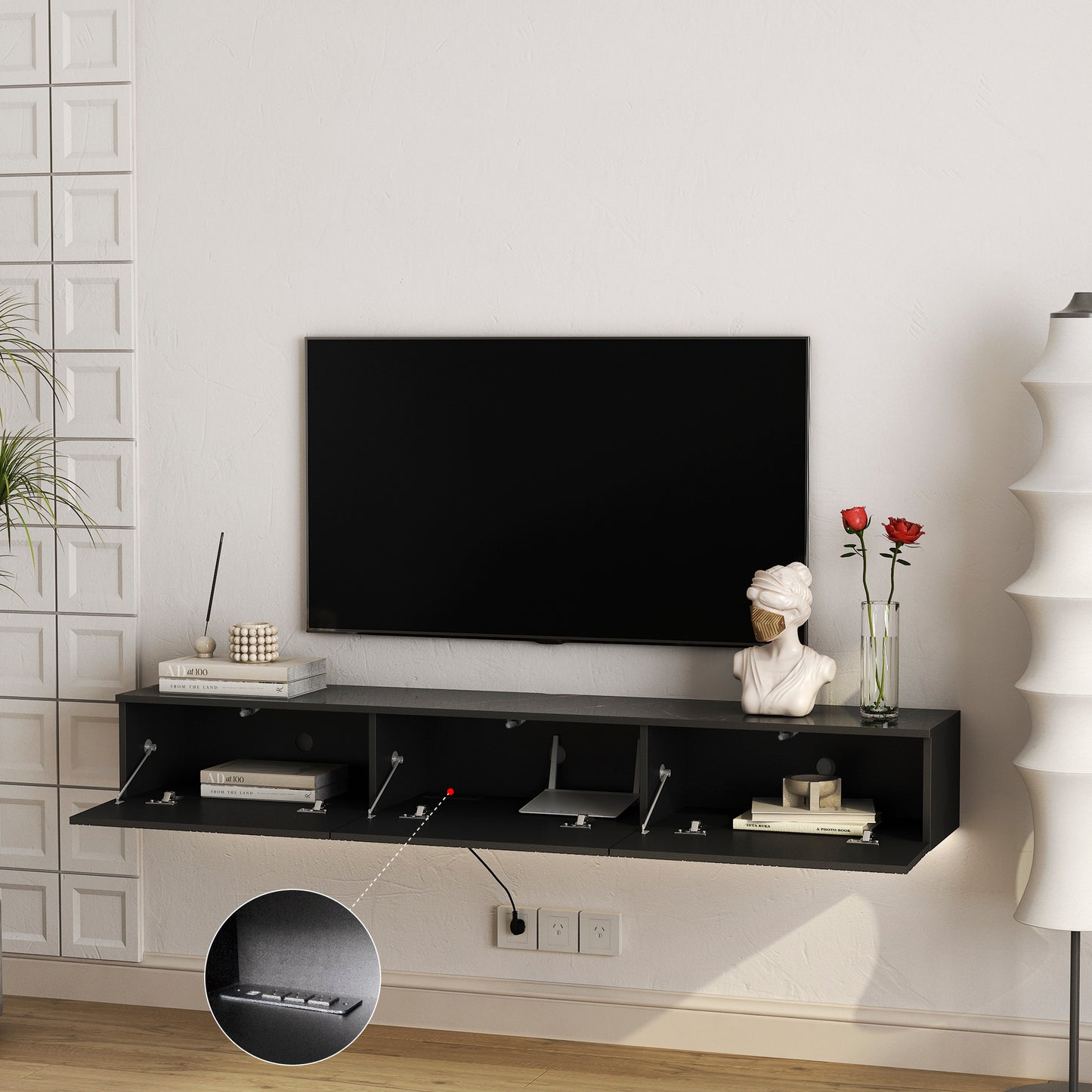 Sleek black wallmounted TV stand with dropdown doors and interior storage for electronics