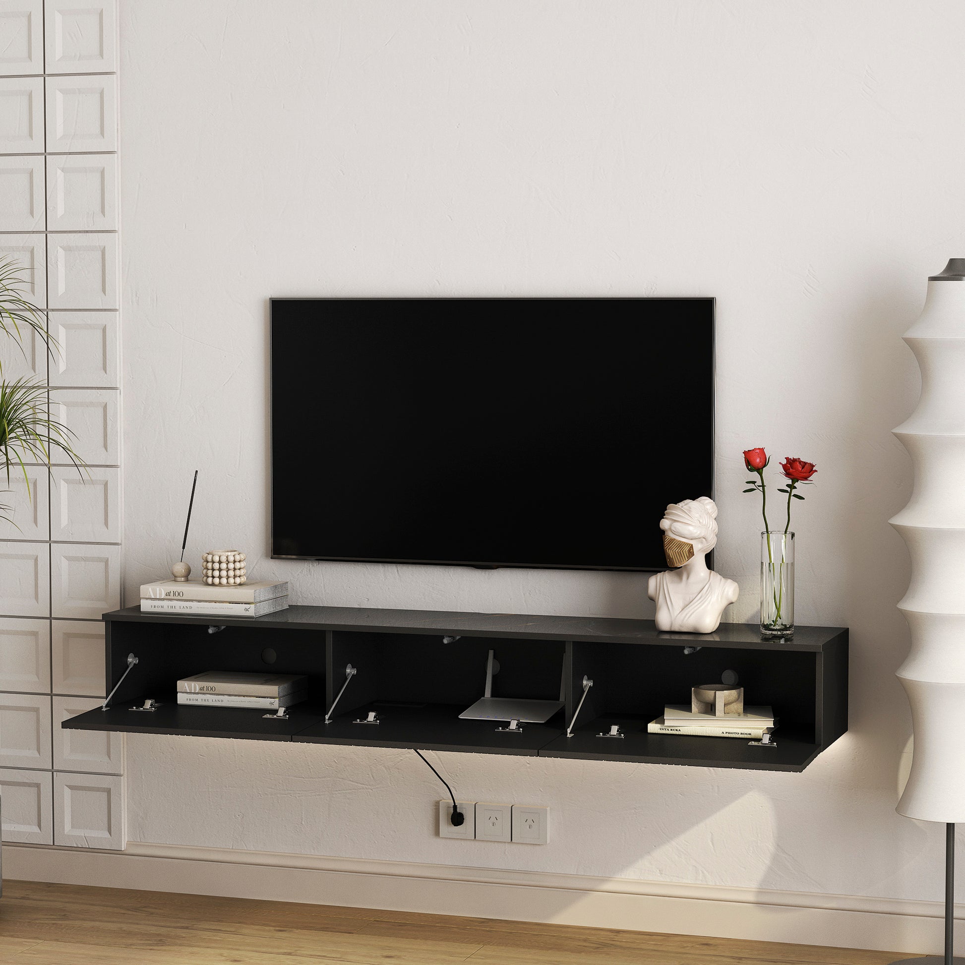 Black floating media console with open compartments and a sleek modern design