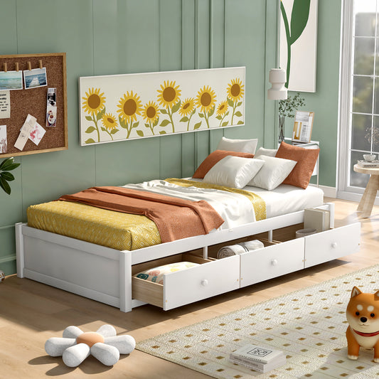 White twin bed with storage drawers and yellow patterned bedding