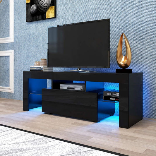 Glossy black TV stand with blue LED lighting featuring open shelves and a drawer for media consoles