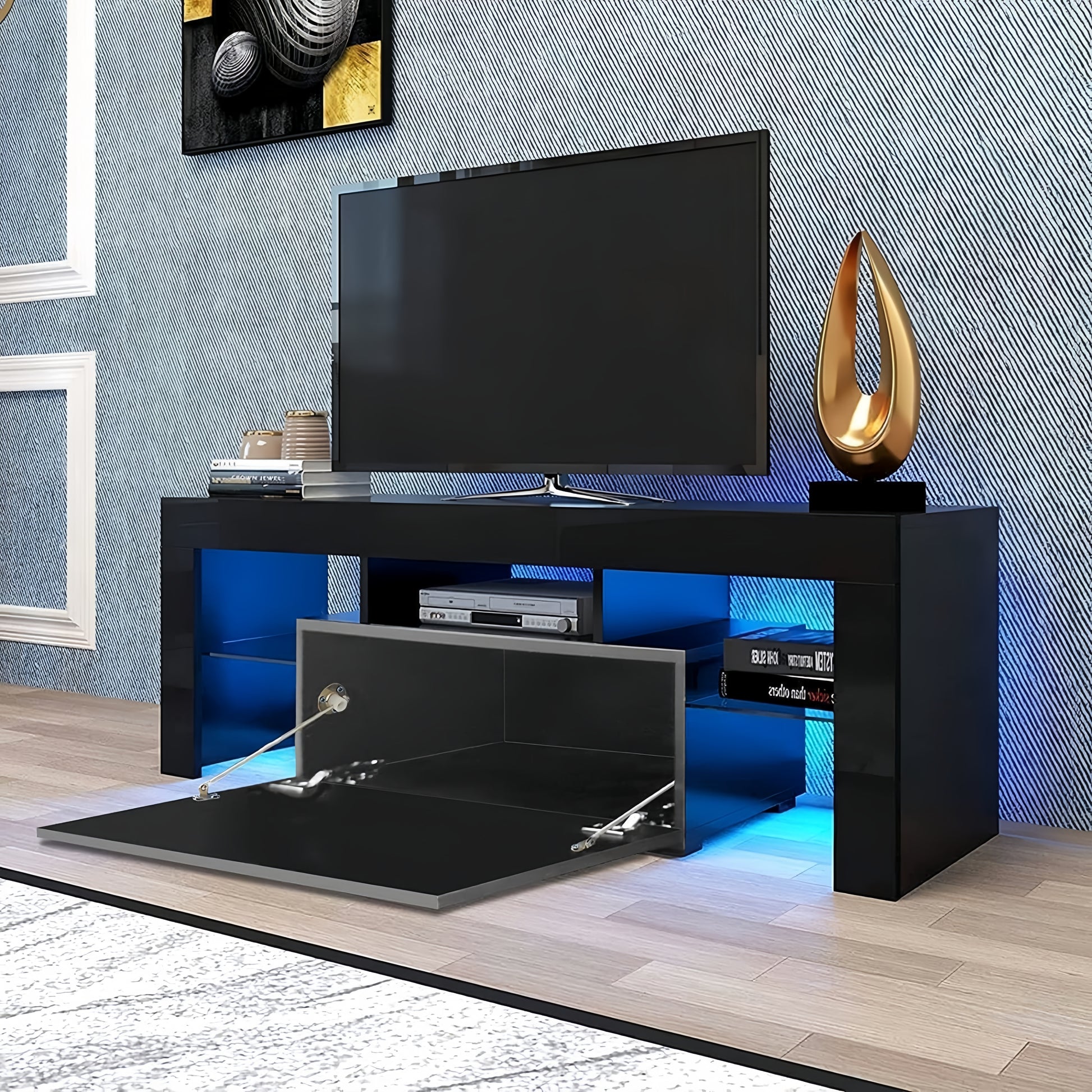 Glossy black TV stand with blue LED lighting and open compartment