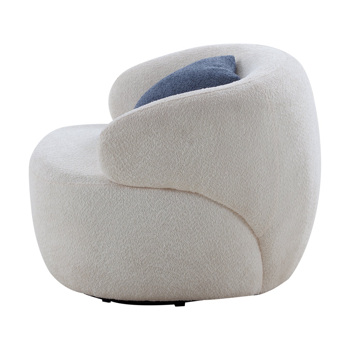 Plush ivory boucle accent chair with curved modern design and navy blue lumbar pillow
