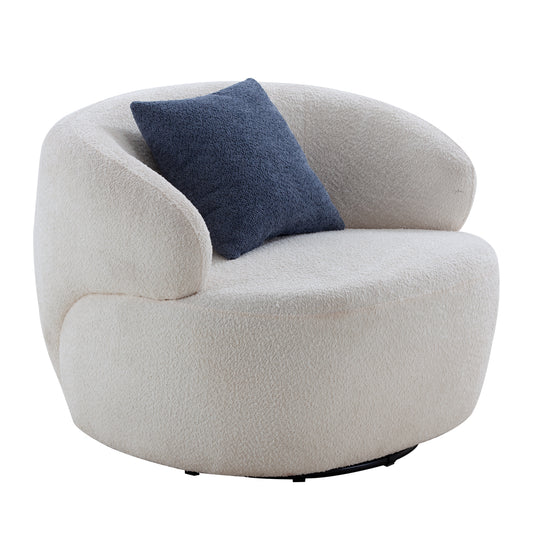 Cream boucle swivel chair with rounded modern design and navy accent pillow