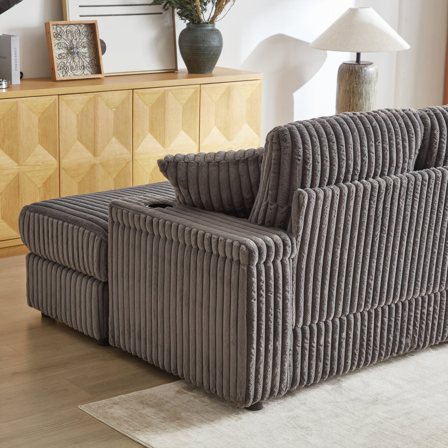 Gray corduroy sectional sofa with plush texture and deep seating comfort