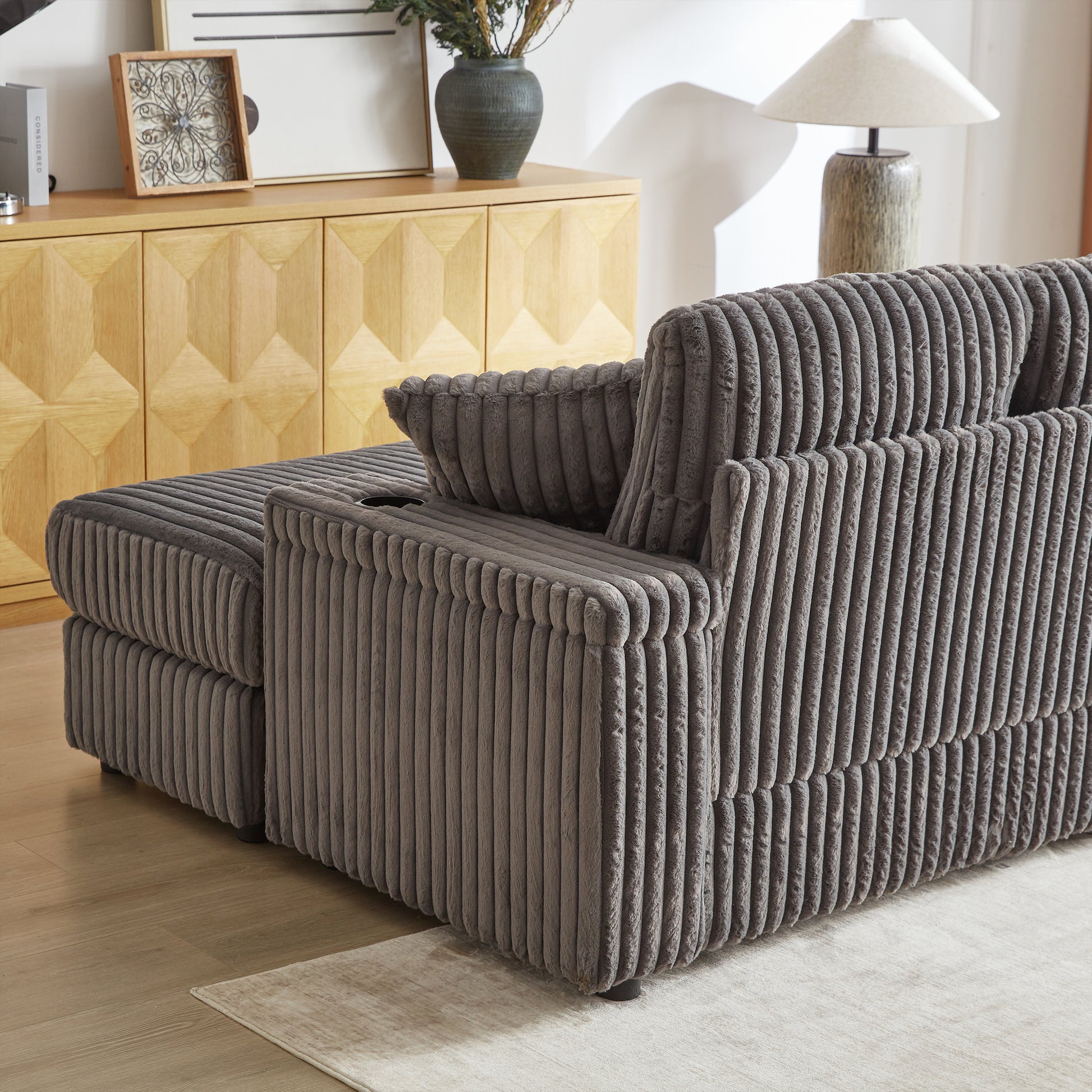 Gray corduroy sectional sofa with plush texture and deep seating comfort