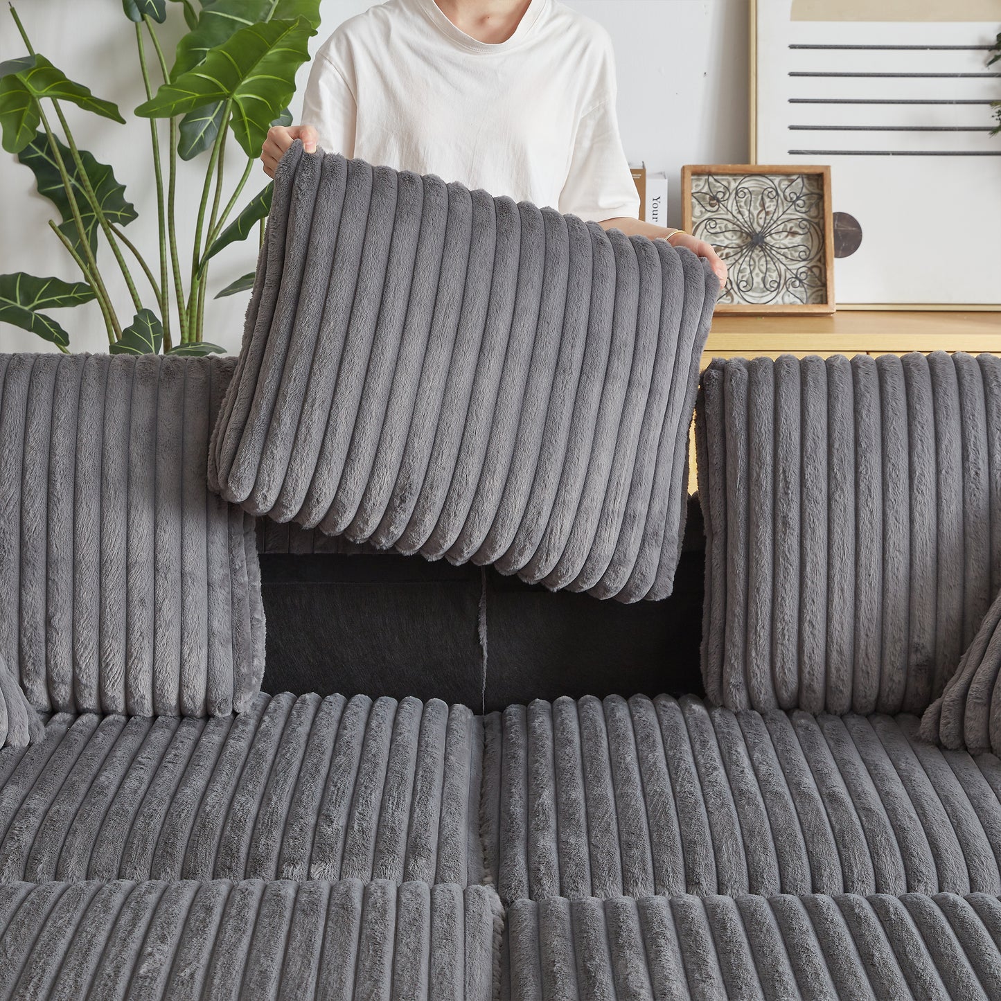 Soft grey corduroy pillow with plush texture perfect for cozy living rooms