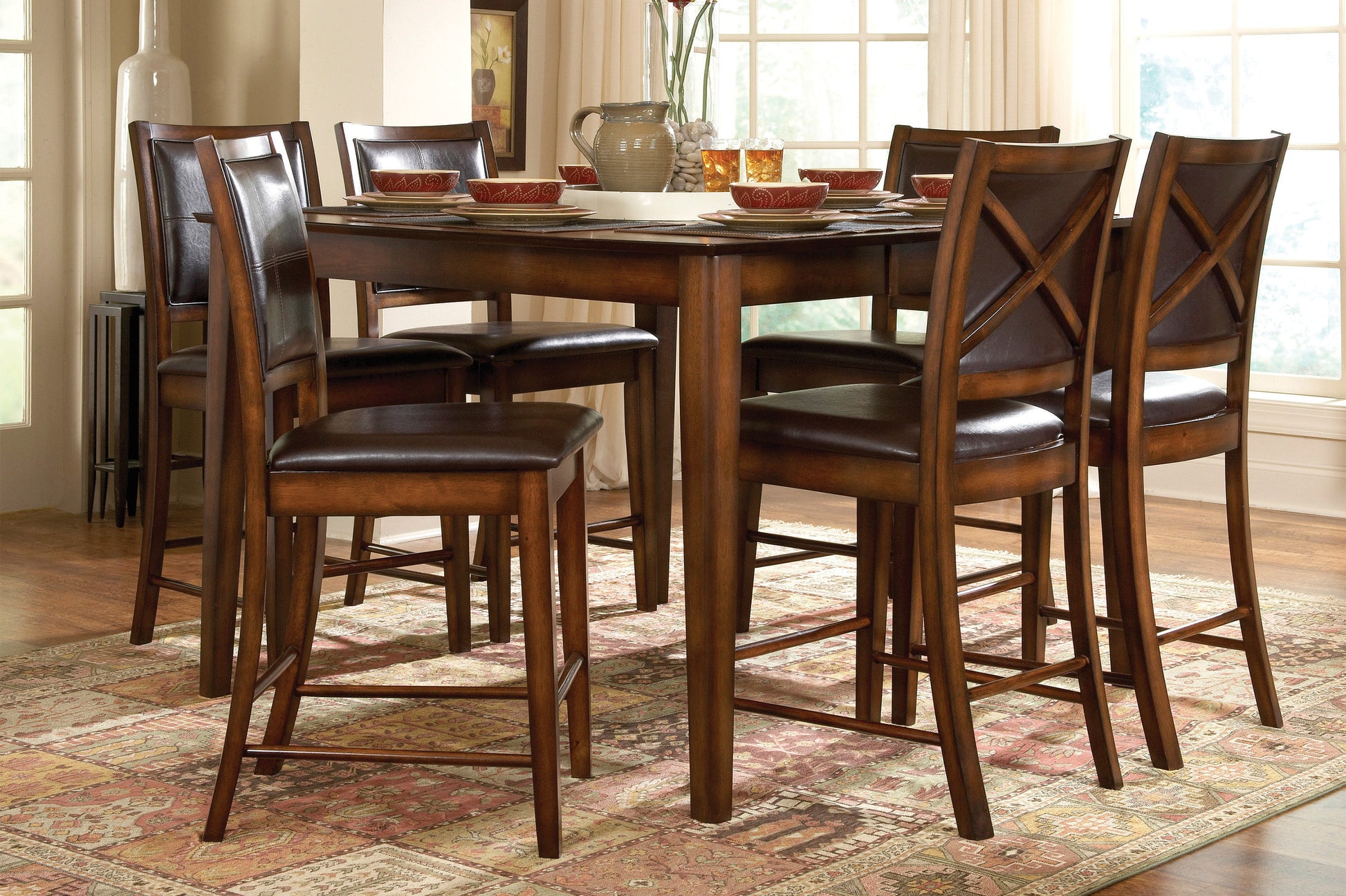 Dark brown leather counter stool with crisscross back detail for a contemporary dining area