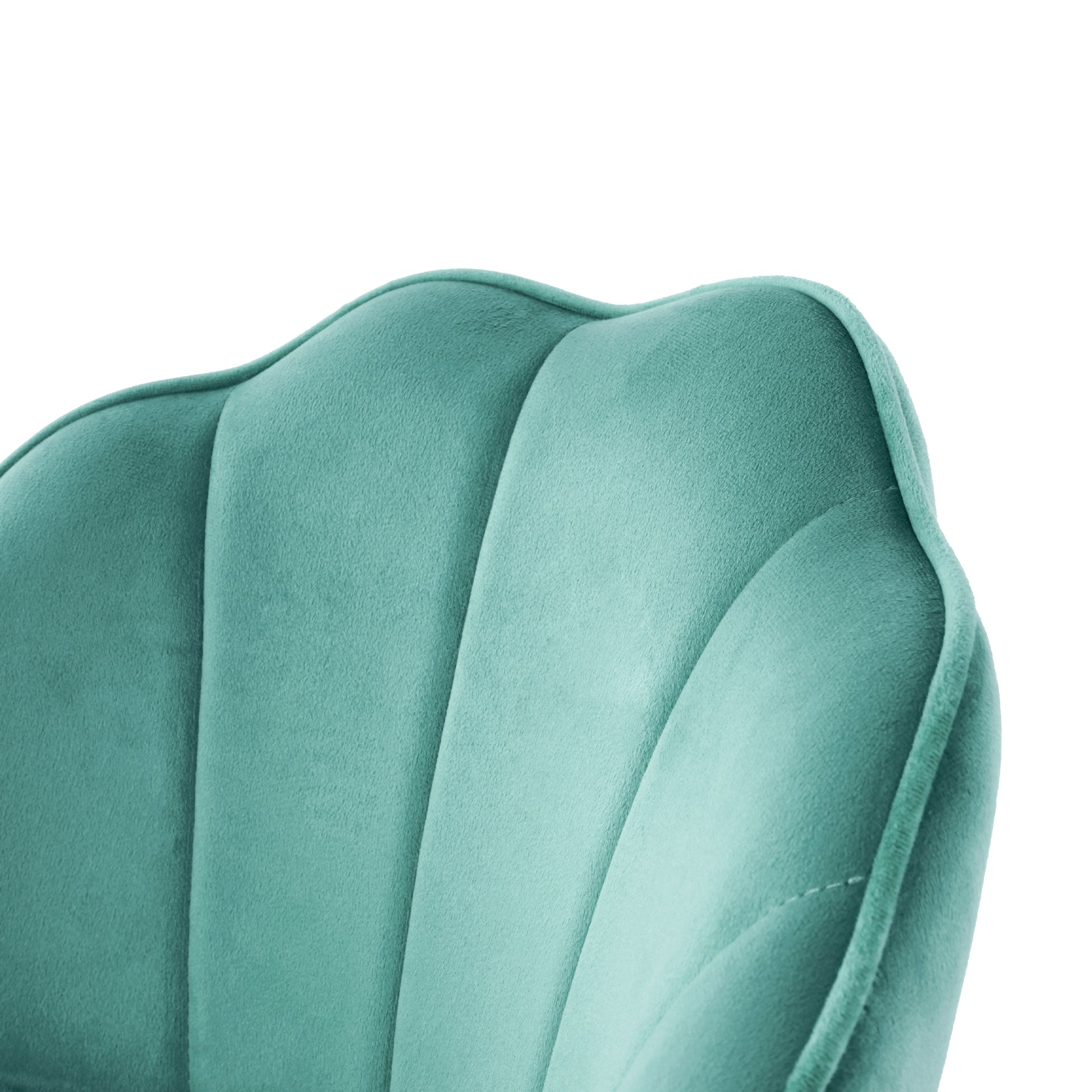 Teal velvet armchair with channeled upholstery offering a plush accent chair