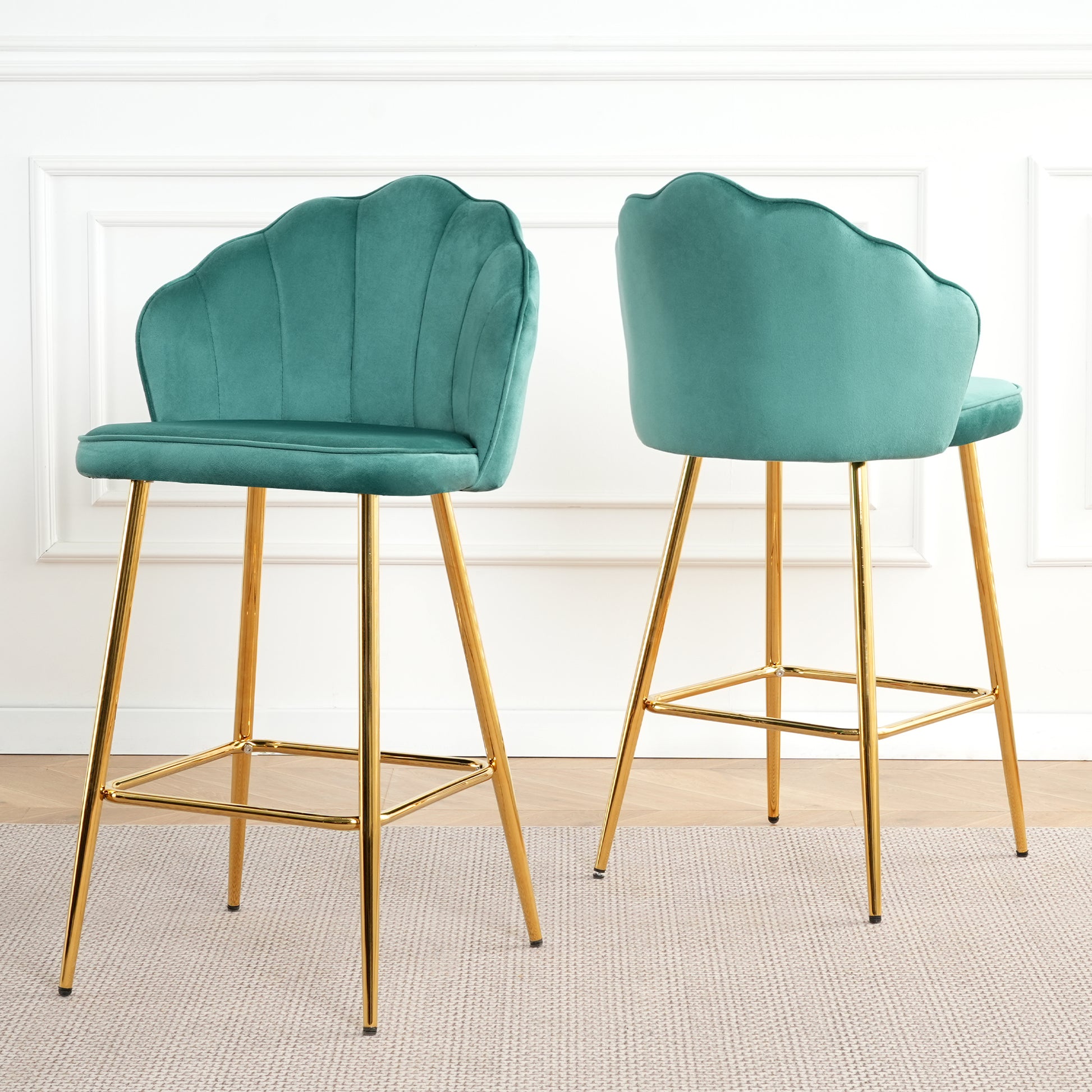 Teal velvet bar stool with scallop back and gold legs a stylish seating option