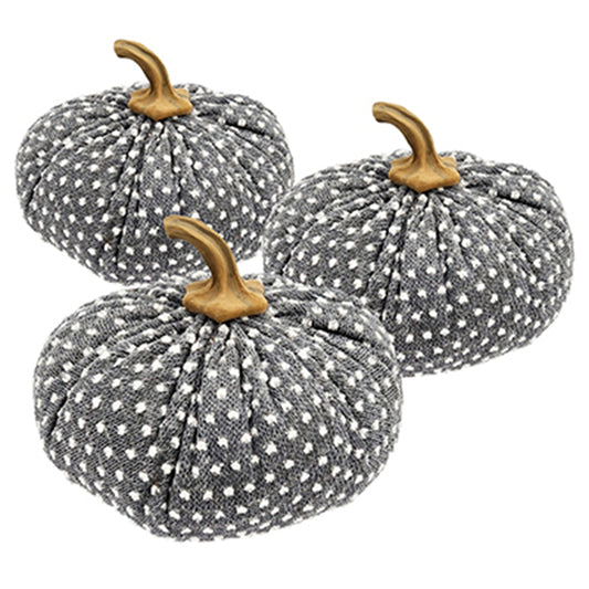 Three fabric decorative pumpkins in grey with white polka dots and brown stems