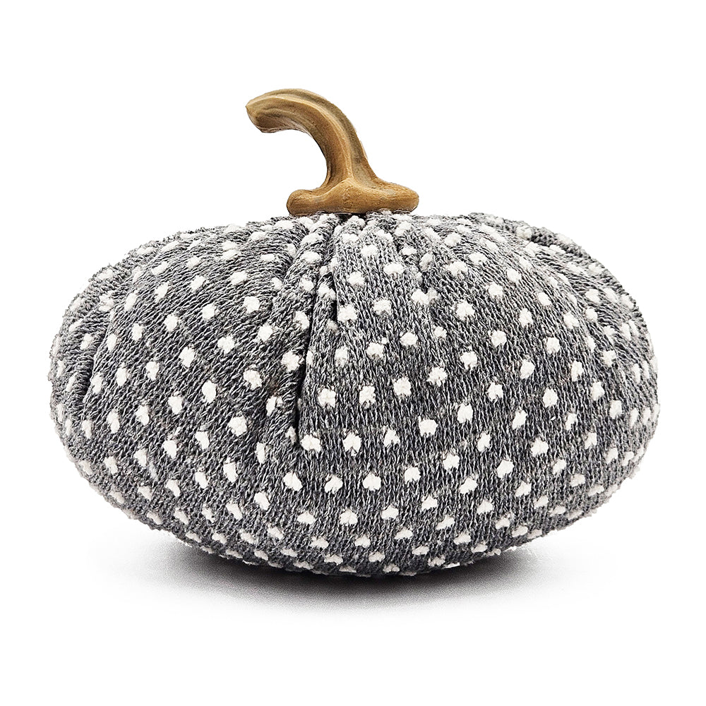Textured gray pumpkin with white polka dots and a wooden stem for fall decor