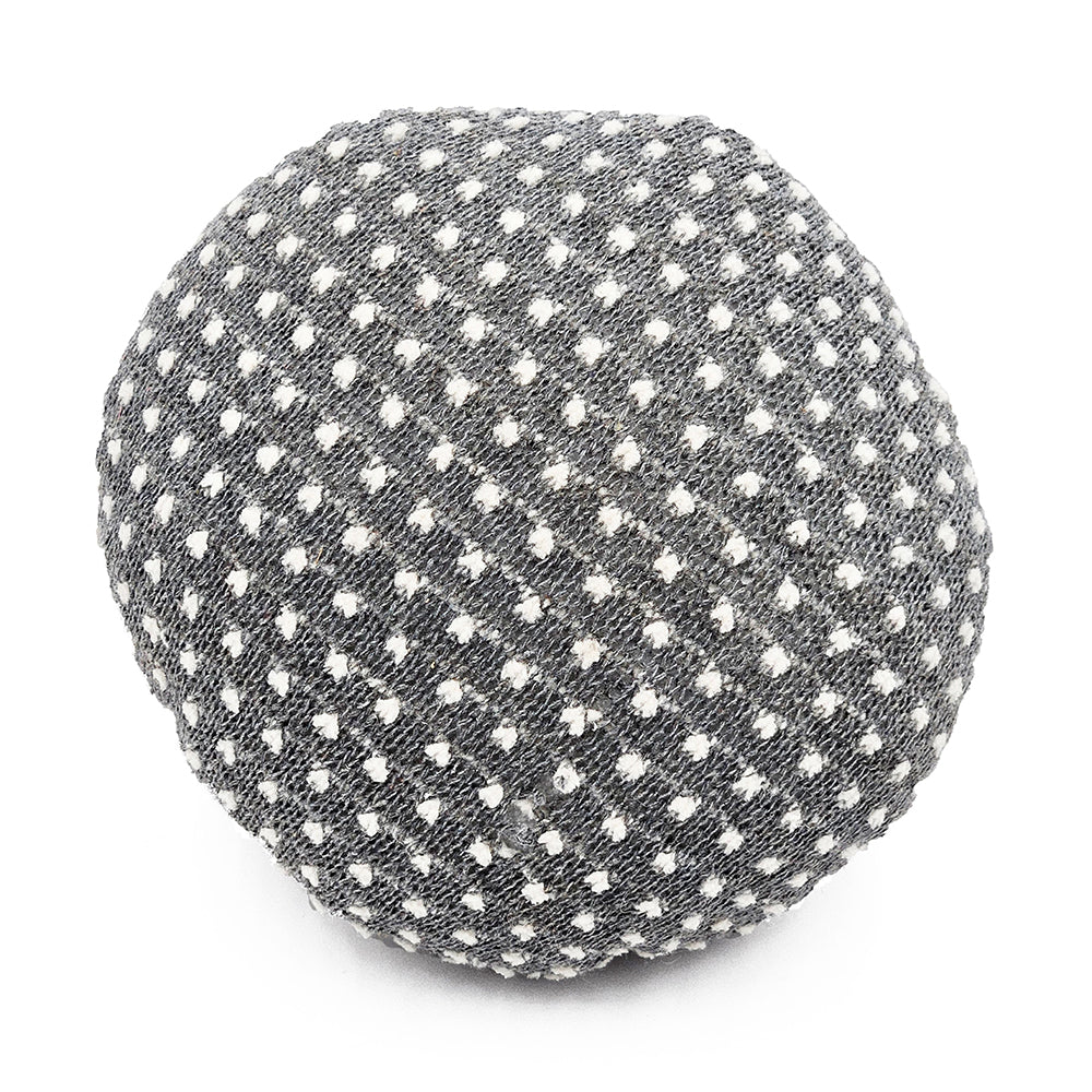 Textured grey spherical accent pillow with white polka dots