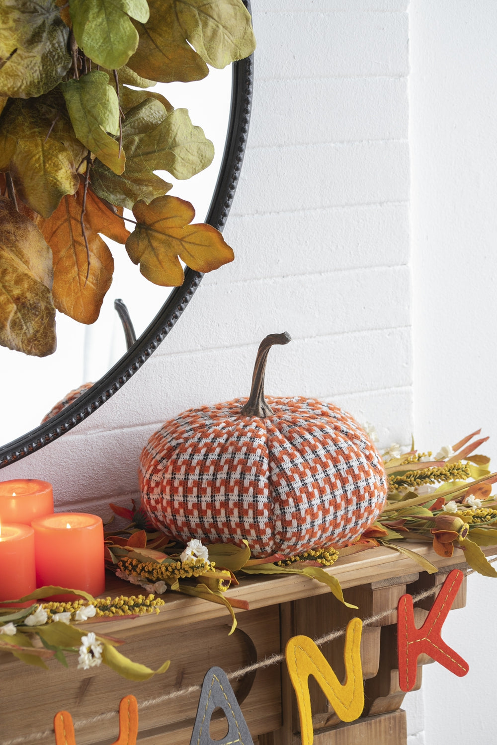 Orange and white houndstooth fabric pumpkin decoration for autumn decor