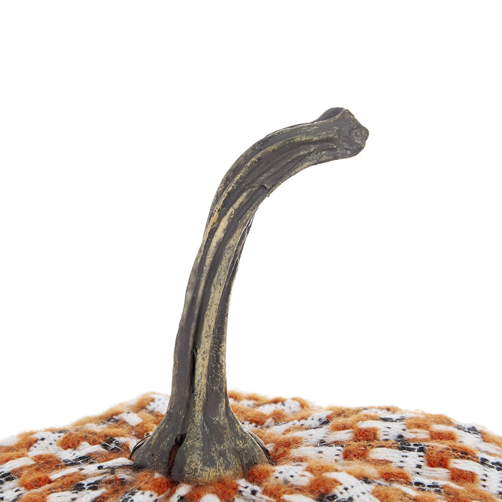 Textured decorative pumpkin with rustic stem and plaid fabric accent