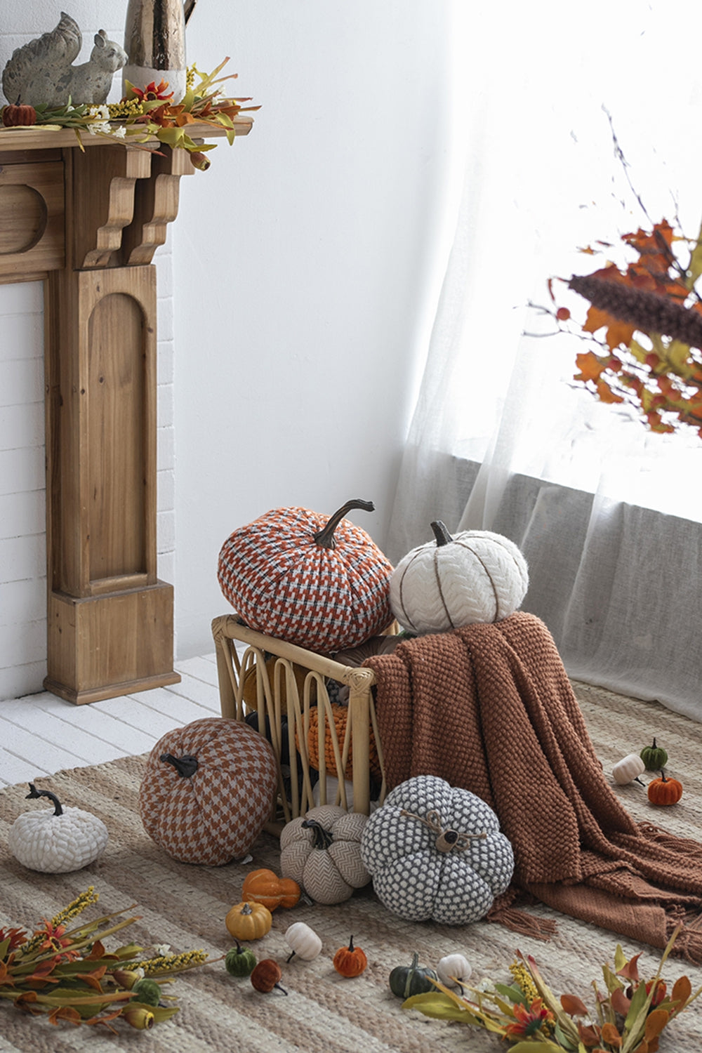 Textured orange and white knit pumpkin with natural stem perfect for autumn decor