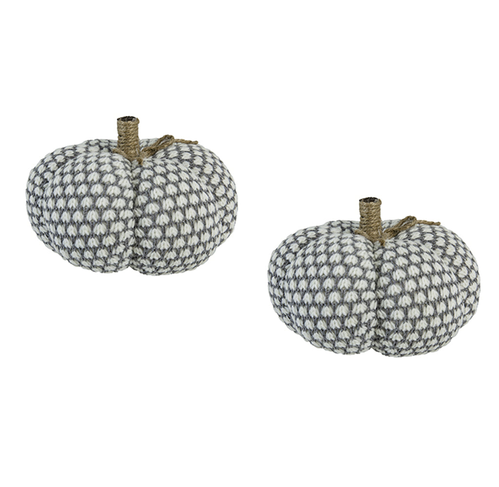 Two white and grey knitted pumpkins with jute stems perfect for fall decor