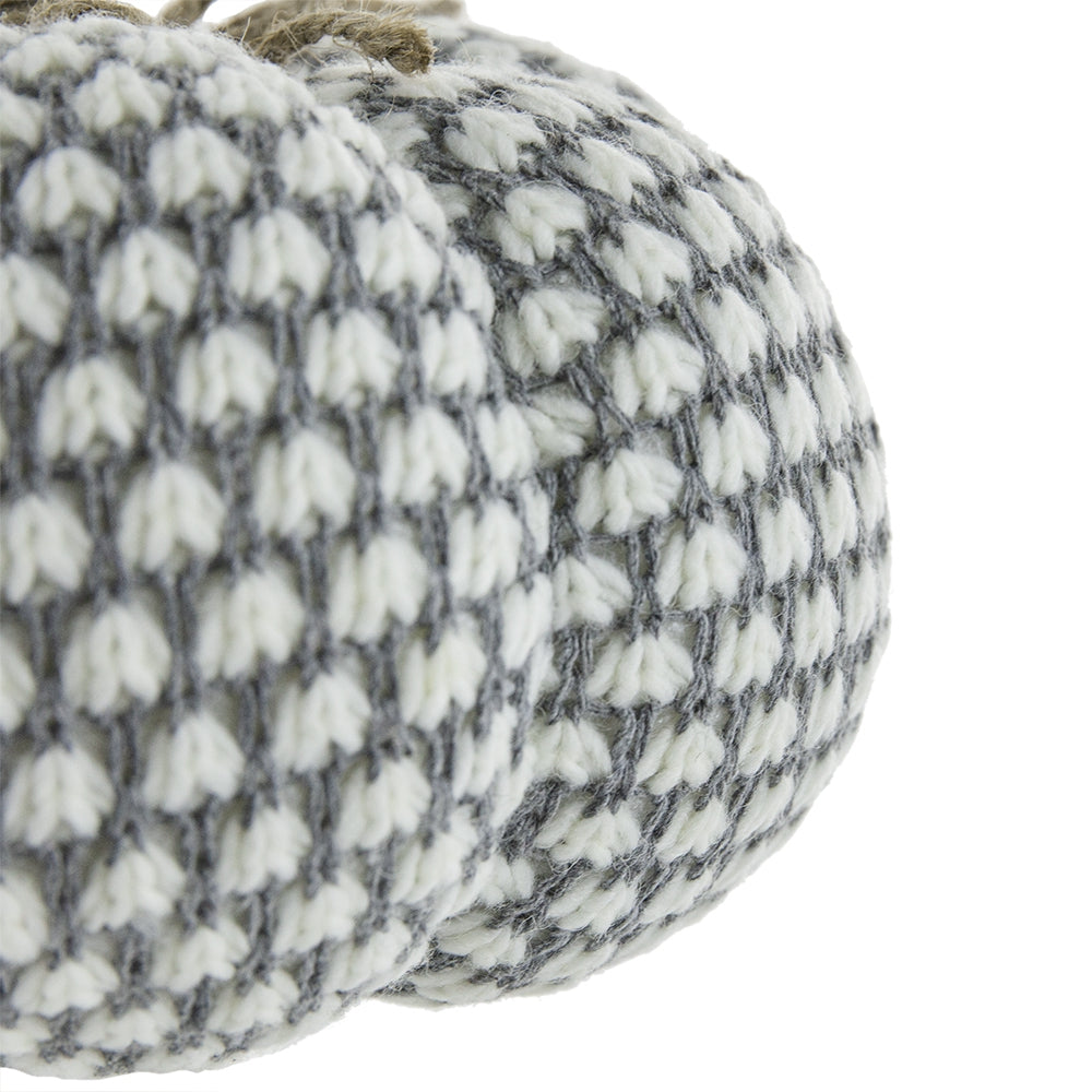 Soft grey and white knit pumpkin with textured weave perfect for autumn decor