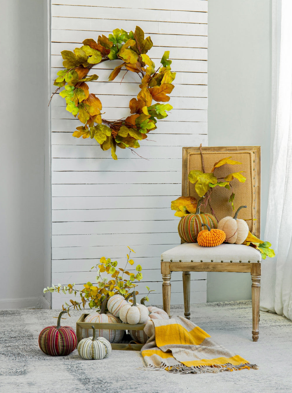 Fall leaf wreath with autumn foliage and rustic decor perfect for seasonal home adornment