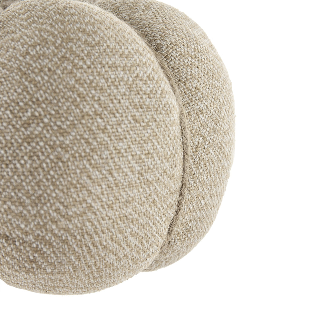 Textured beige fabric pumpkin accent piece with stitched seams