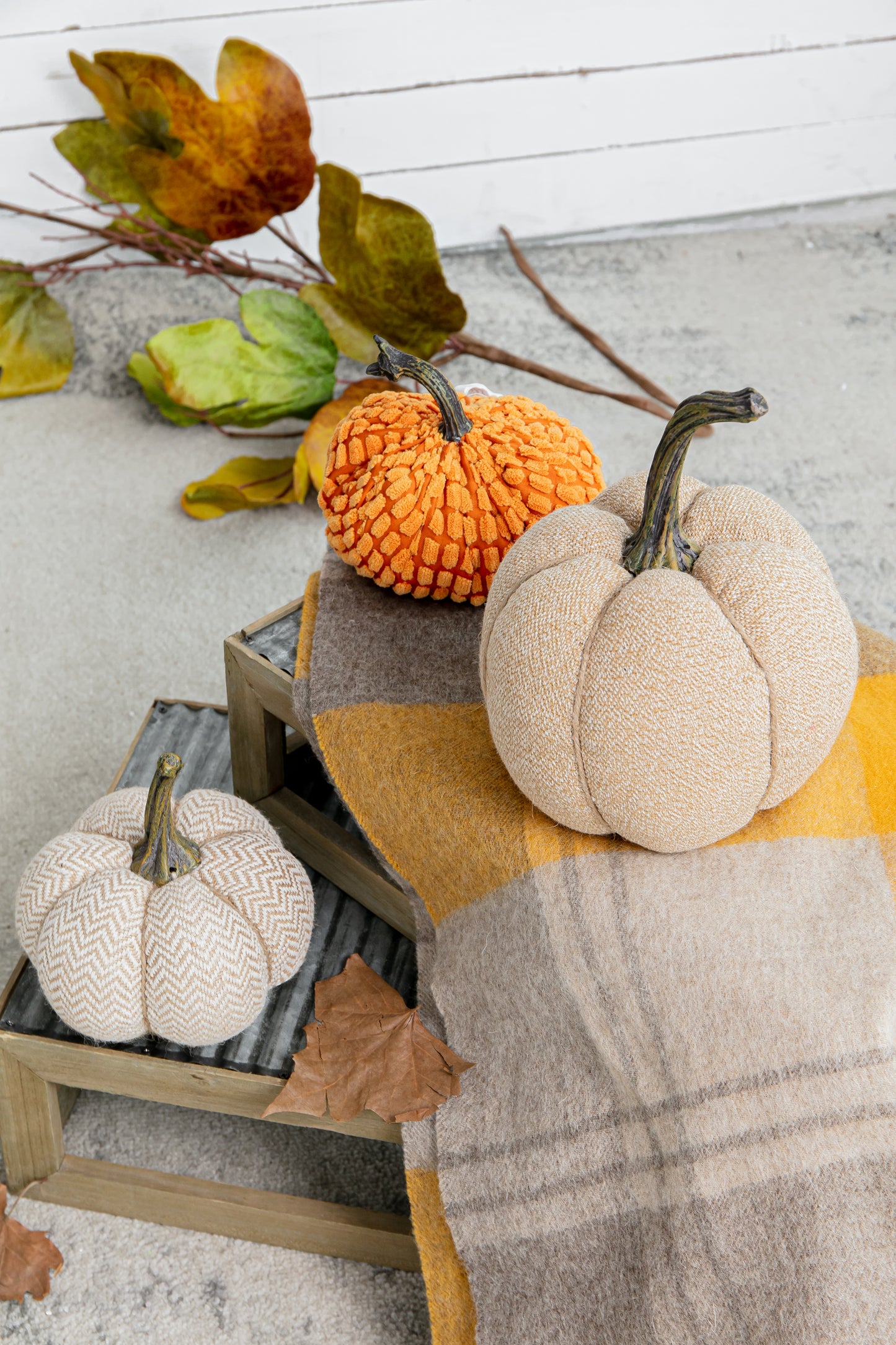 Textured orange decorative pumpkin with a nubby fabric finish perfect for autumn displays