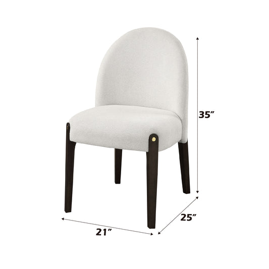 Cream boucle dining chair with dark wood legs measuring  H x  W