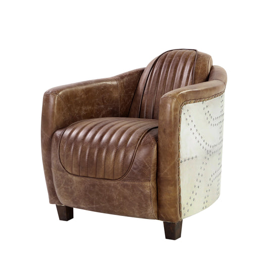 Brown leather armchair with distressed finish and riveted metal side panels Features channel tufting on seat and back
