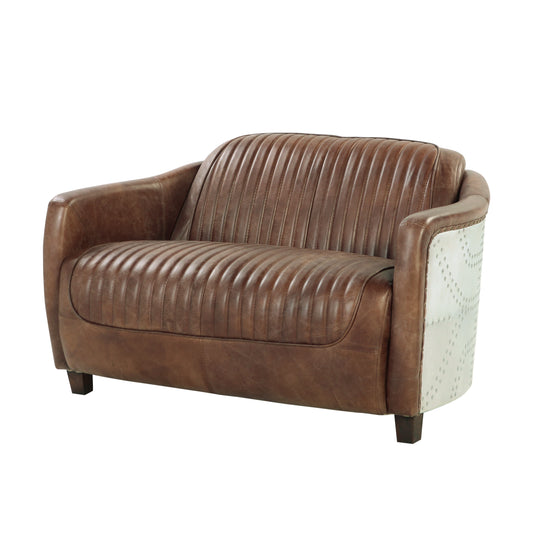 Brown leather armchair with stitched detailing and metal accents