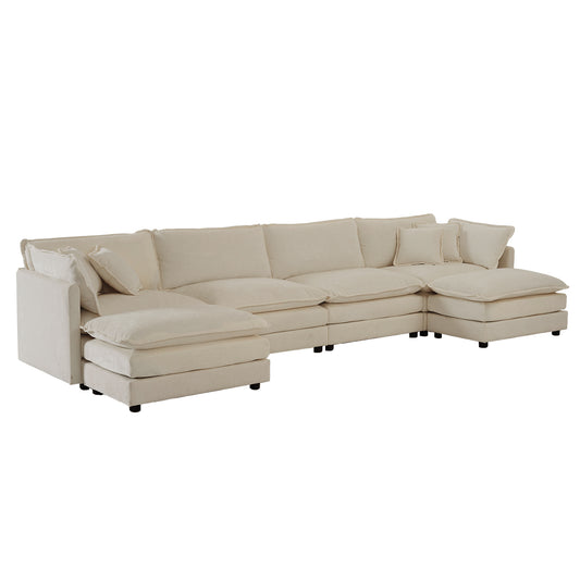 Beige fabric modular sectional sofa with chaise lounges and accent pillows