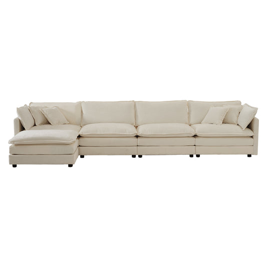 Plush cream sectional sofa with chaise offering deep seating and modern comfort for any living space