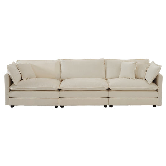 Comfortable cream linen sectional sofa with plush cushions and decorative pillows