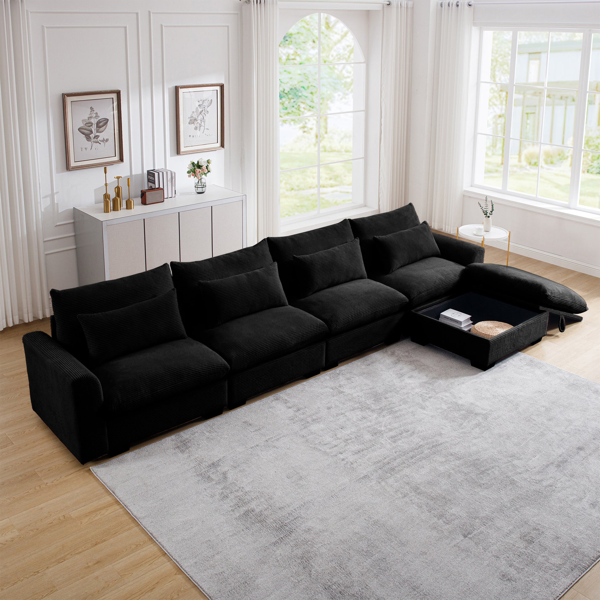 Spacious black corduroy sectional sofa with hidden storage ottoman and plush cushions