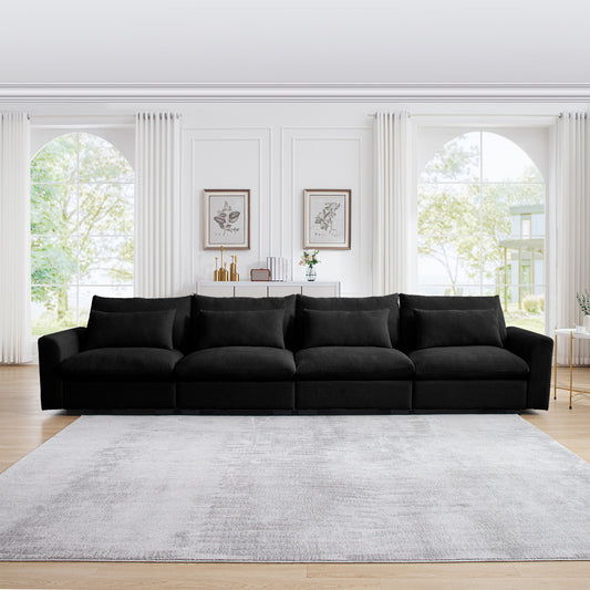 Black corduroy sectional sofa with plush pillows perfect for modern living rooms