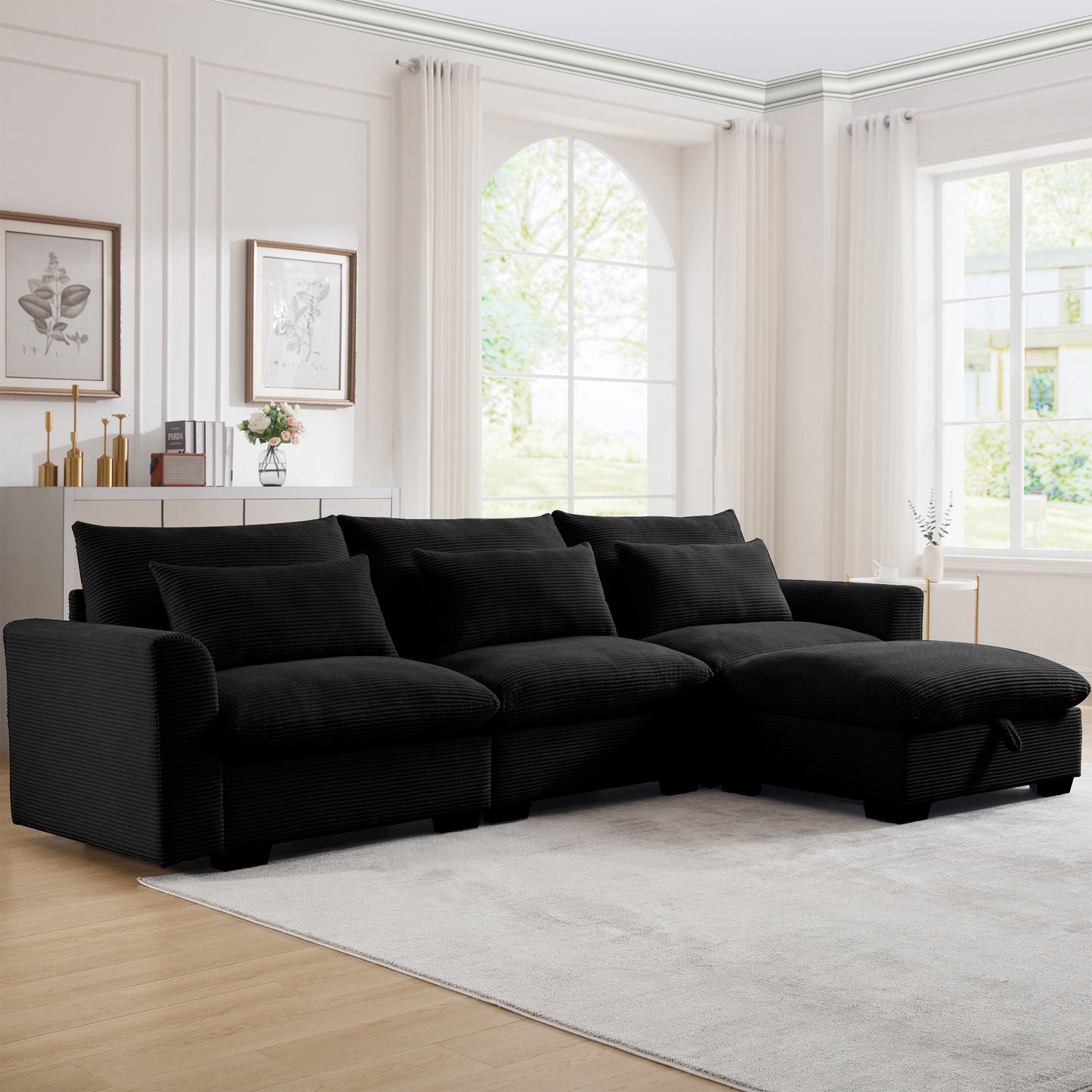 Black corduroy sectional sofa with plush cushions and chaise lounge