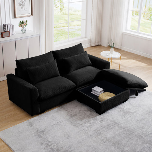 Plush black corduroy sectional sofa with deep seats and wide arms perfect for a modern living room