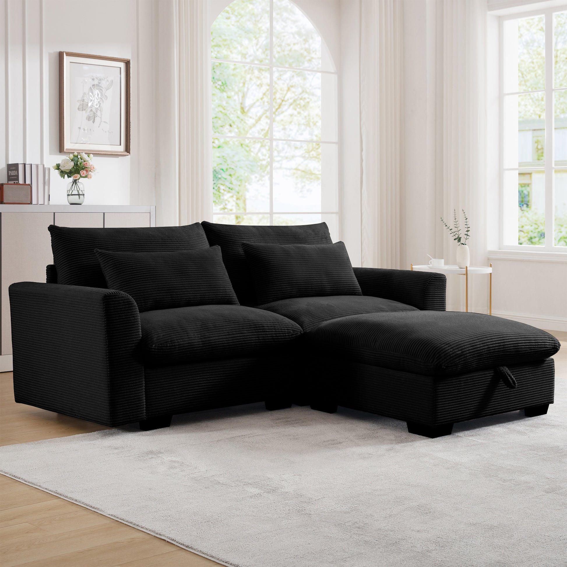 Black corduroy sectional sofa with chaise lounge and storage ottoman