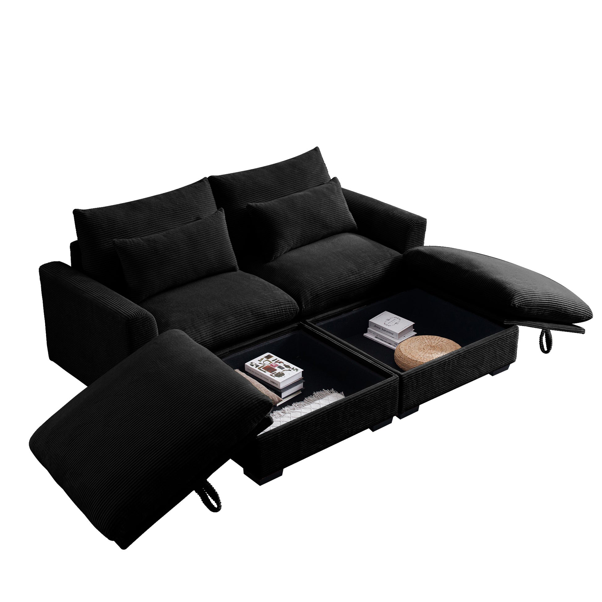 Black corduroy sectional sofa with hidden storage compartments open displaying books