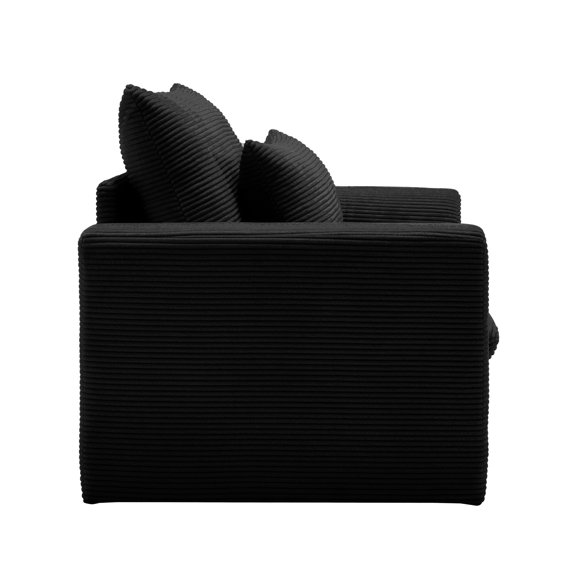 Black corduroy sofa with plush back pillows modern living room furniture