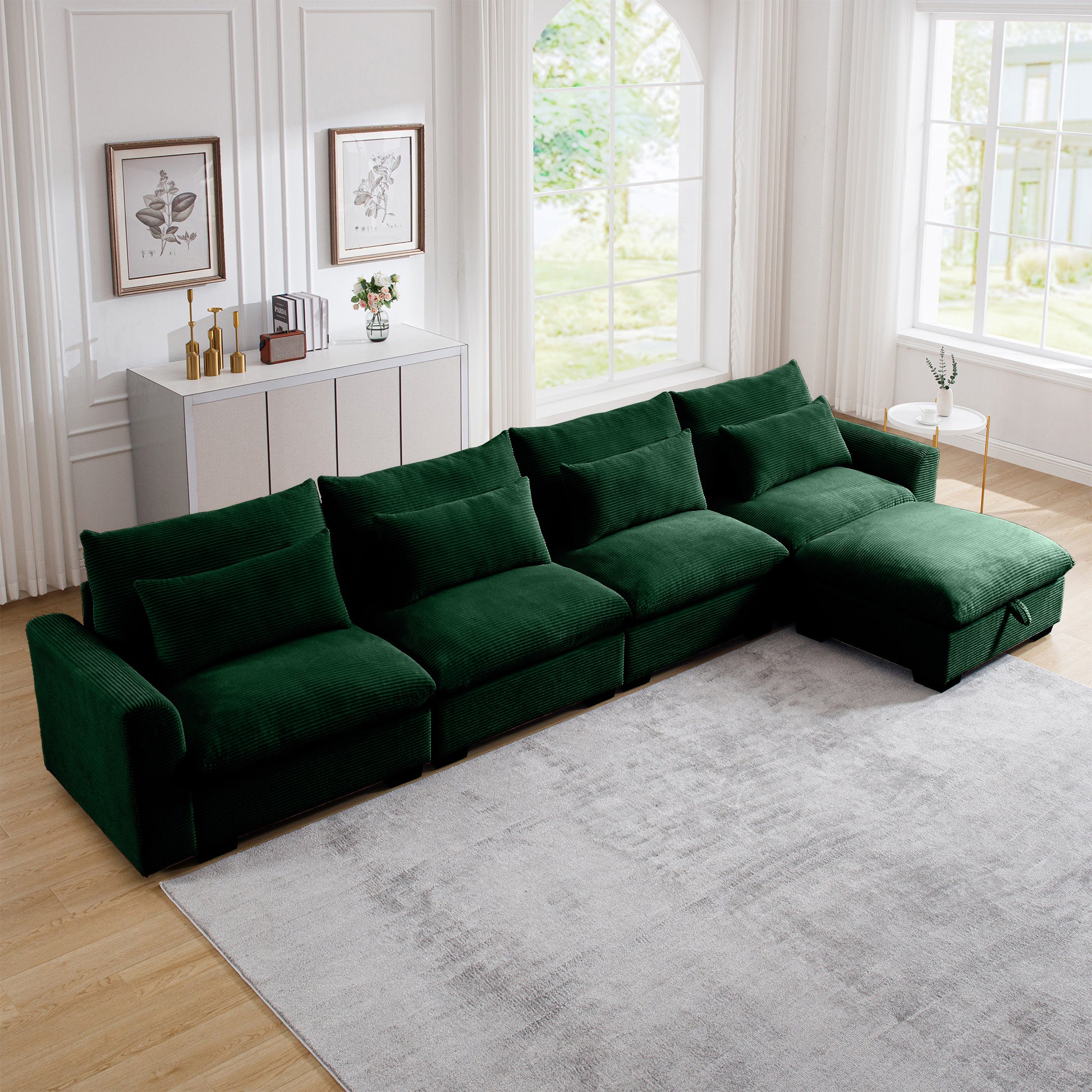 Deep emerald green corduroy sectional sofa with plush cushions and a chaise lounge