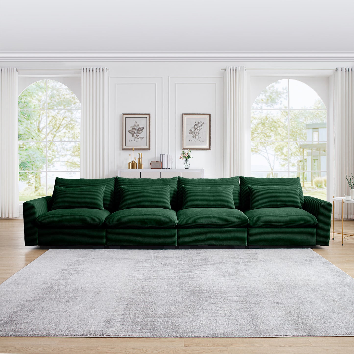 Emerald green corduroy sectional sofa with plush throw pillows