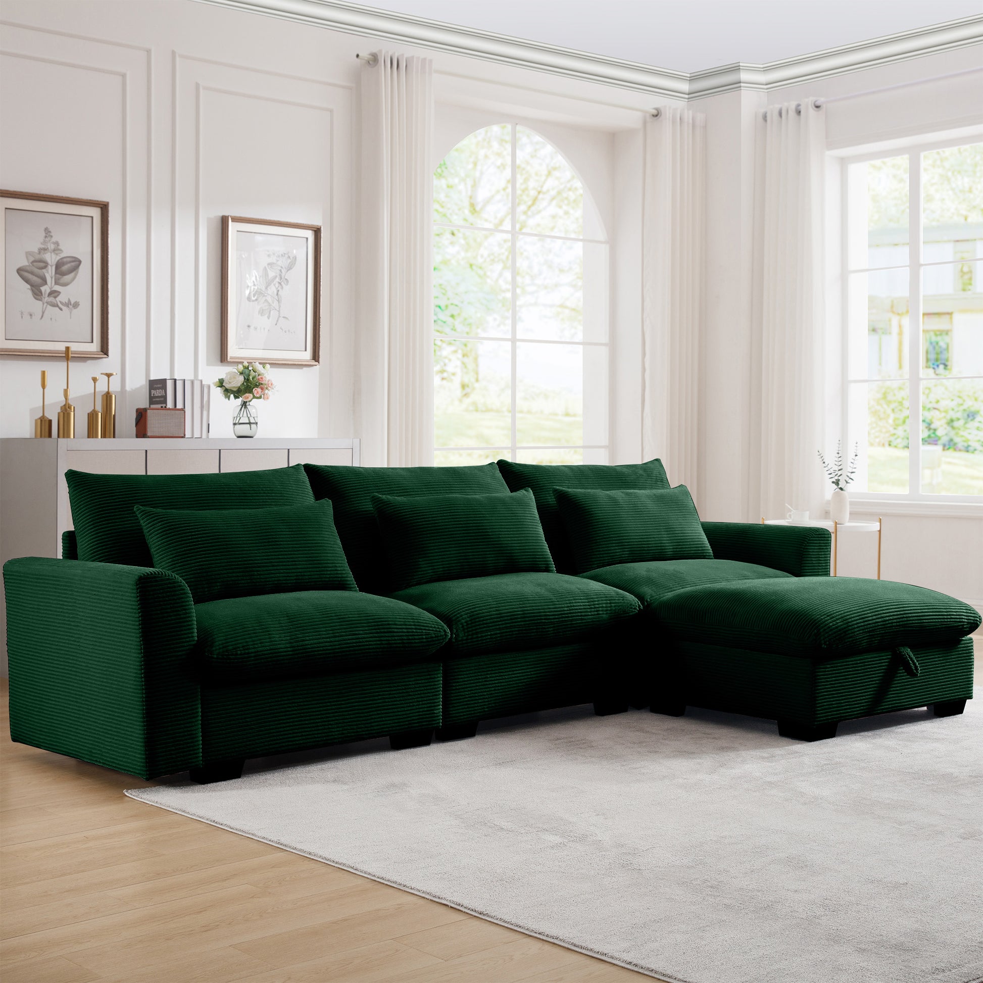 Deep green corduroy sectional sofa with plush cushions and a chaise lounge