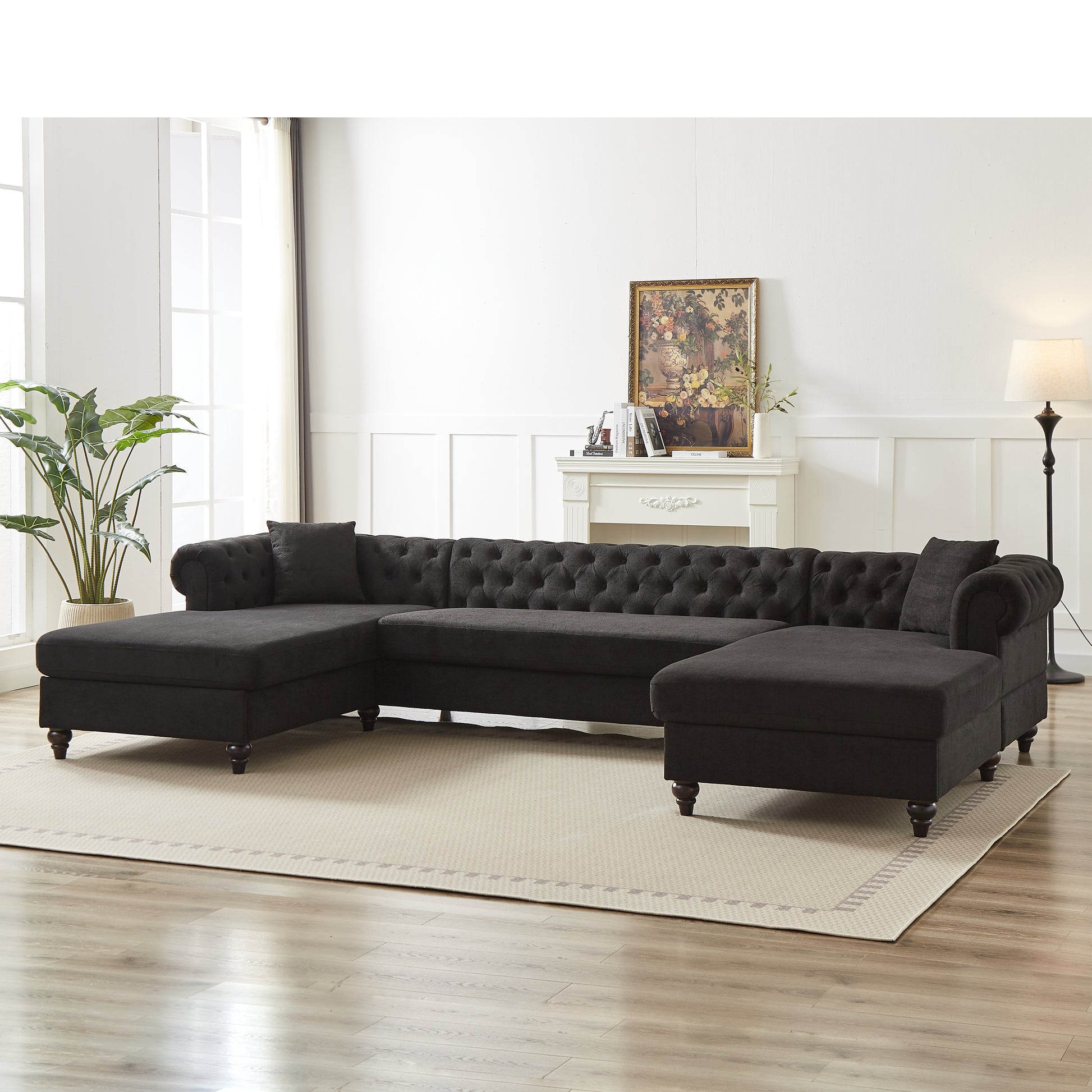 Dark charcoal velvet tufted sectional sofa with chaise lounge and ottoman