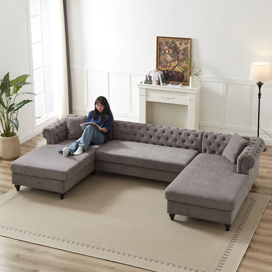 Tufted grey fabric sectional sofa with chaise ideal for spacious living rooms