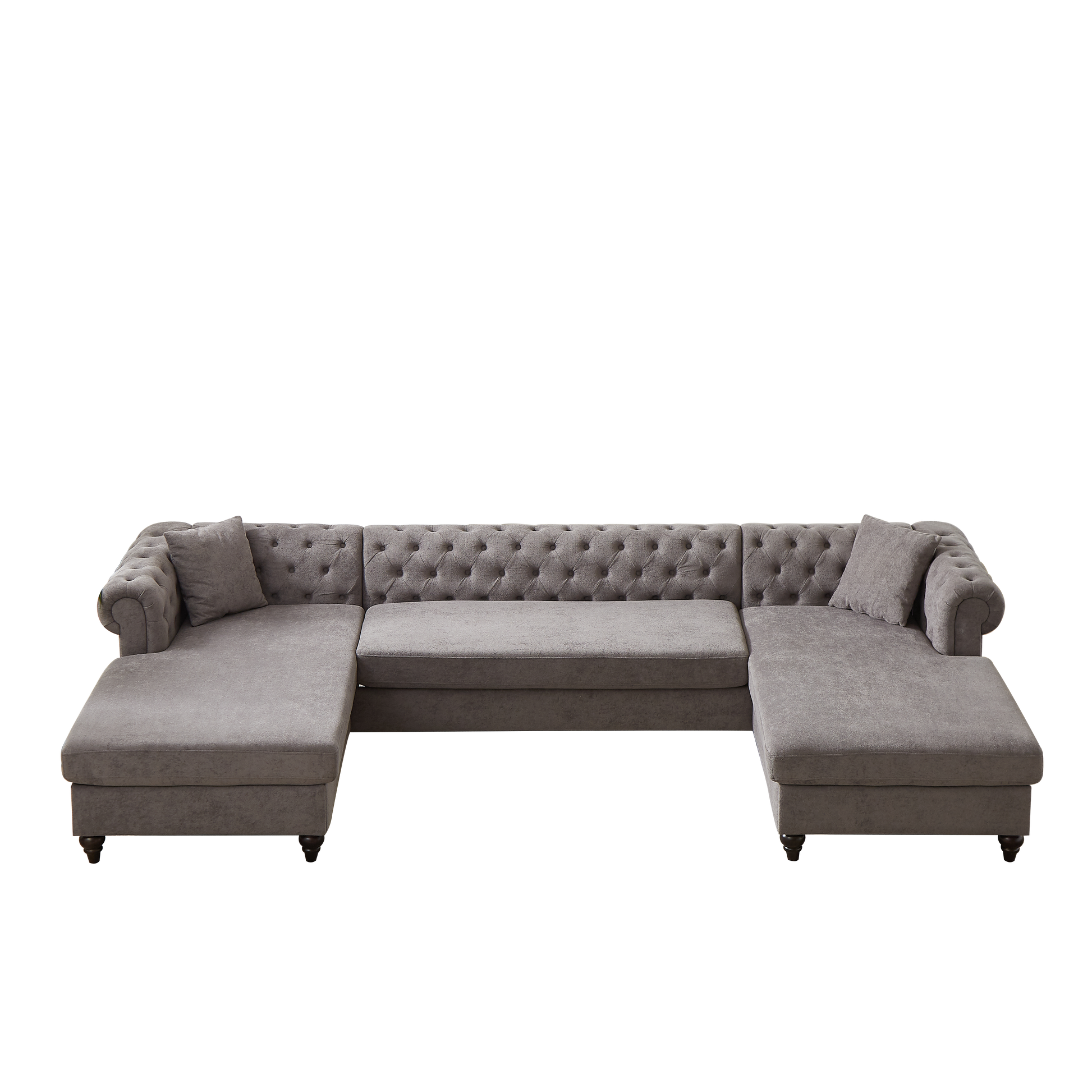 Plush gray tufted sectional sofa with chaise lounges and classic wooden legs